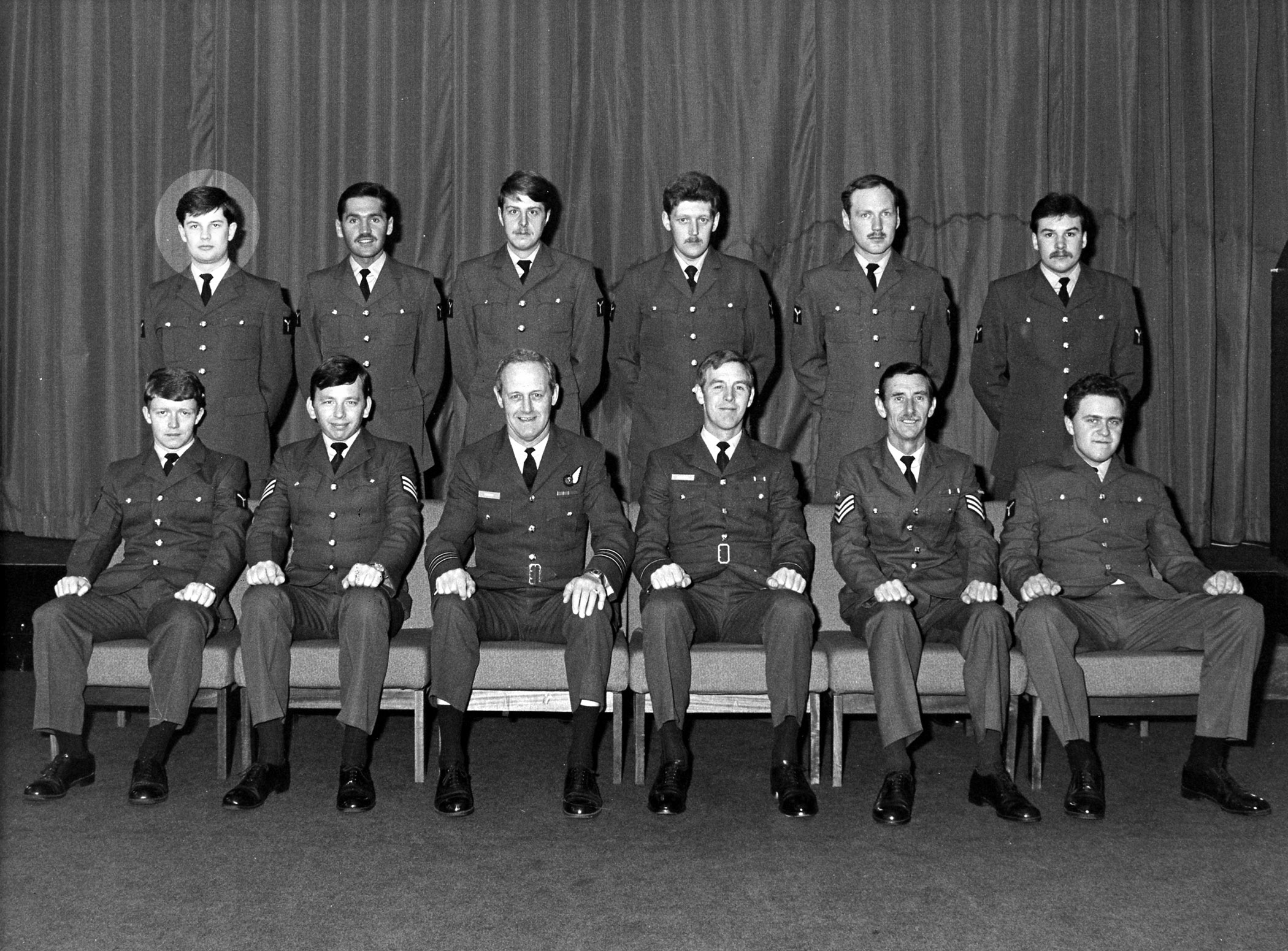 Photo: Squadron Leader Stuart Masters in a group photo, pictured back row, first on the left